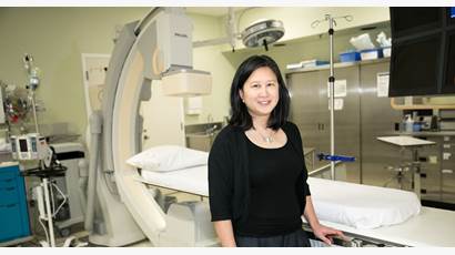 Dr. Susanna Mak in a hospital treatment room.